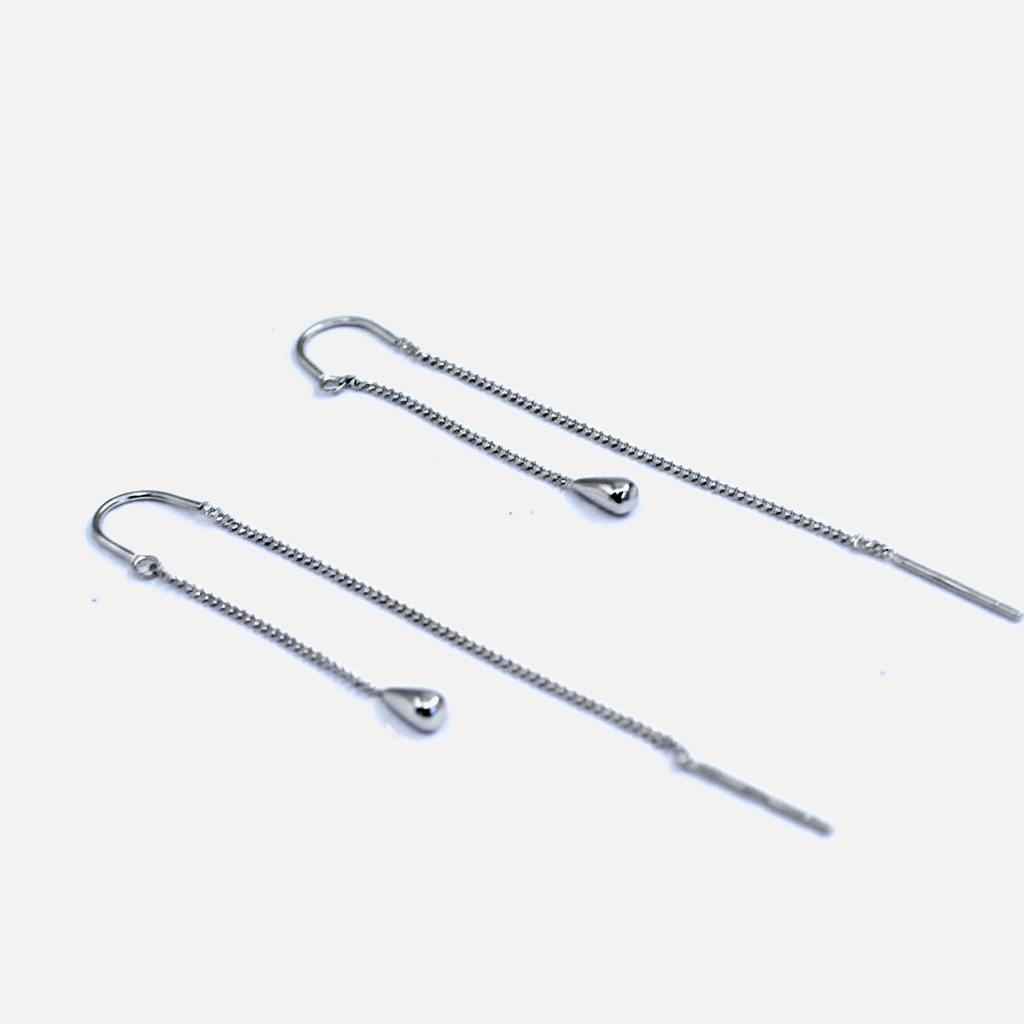 עגילי כסף סרוך - flat lay
